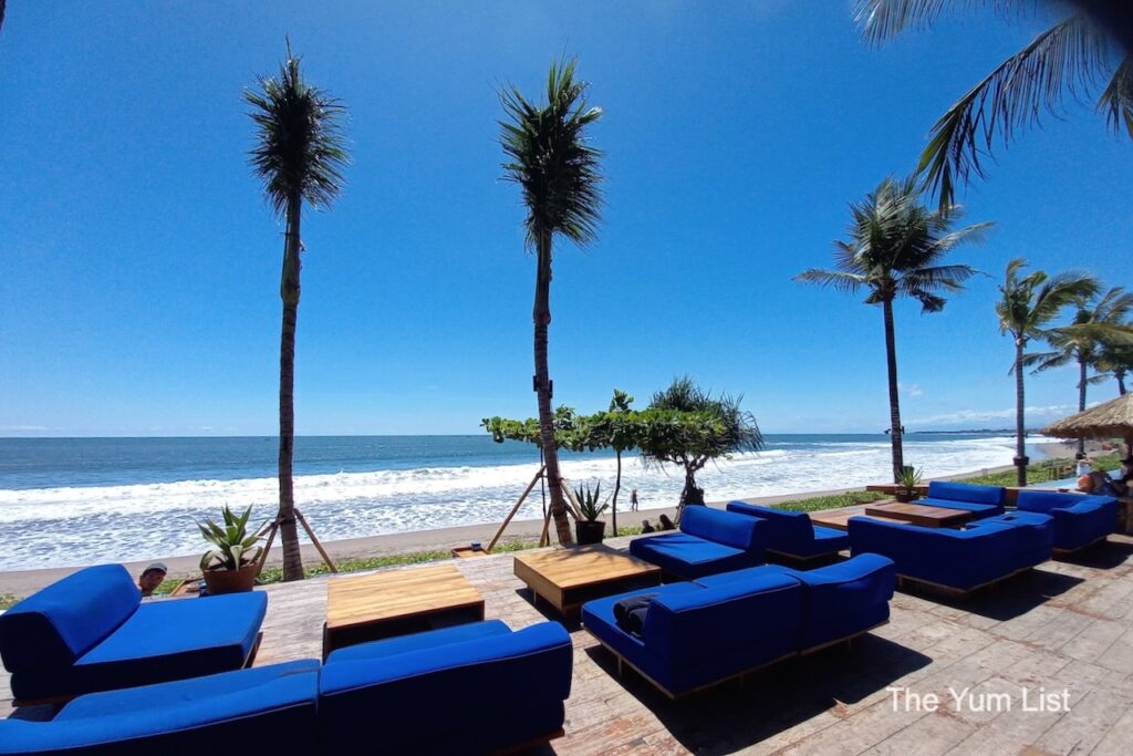 Best Clubs Seminyak blue beach lounge chairs