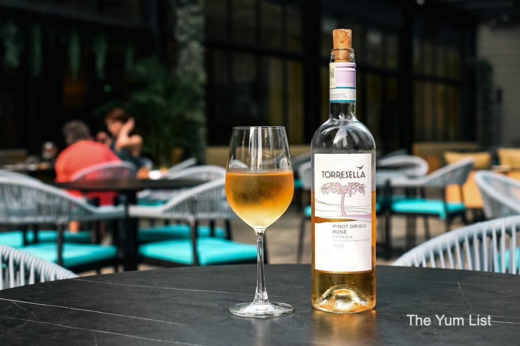 Le Mirch KL Avenue K Torresella Pinot Grigio Rosé bottle and glass of wine