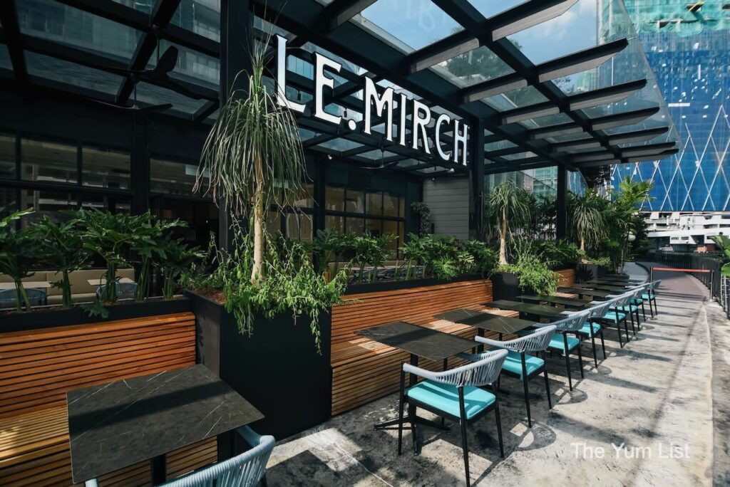 Indian Restaurant & Bar Rooftop Kuala Lumpur alfresco seating area with plants