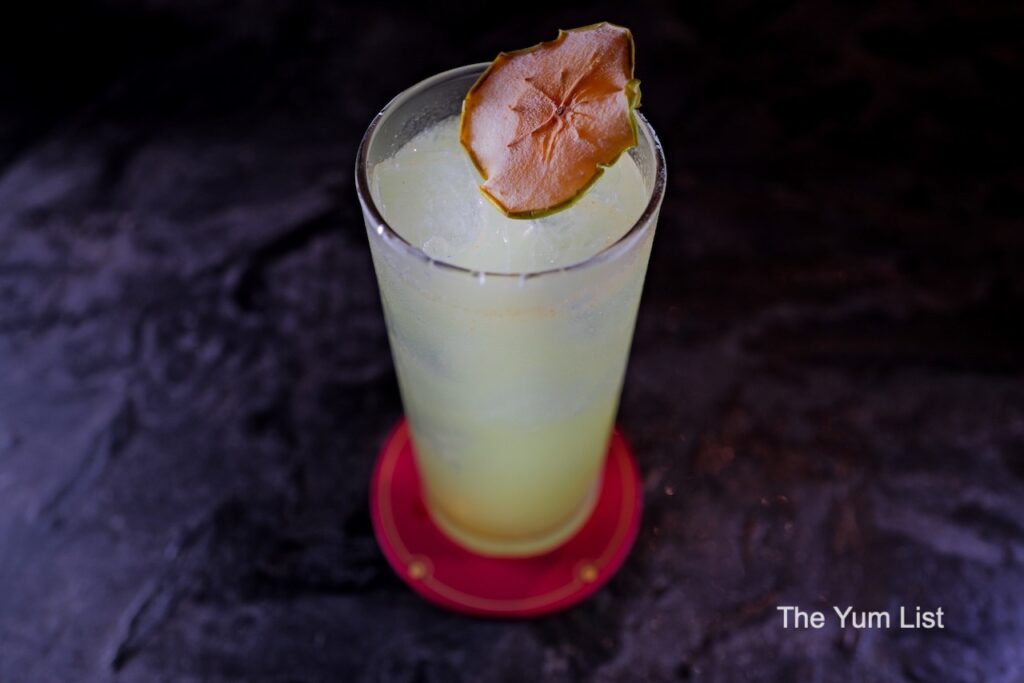 Hidden Cocktail Bar KL The Big Apple cocktail with dehydrated apple garnish