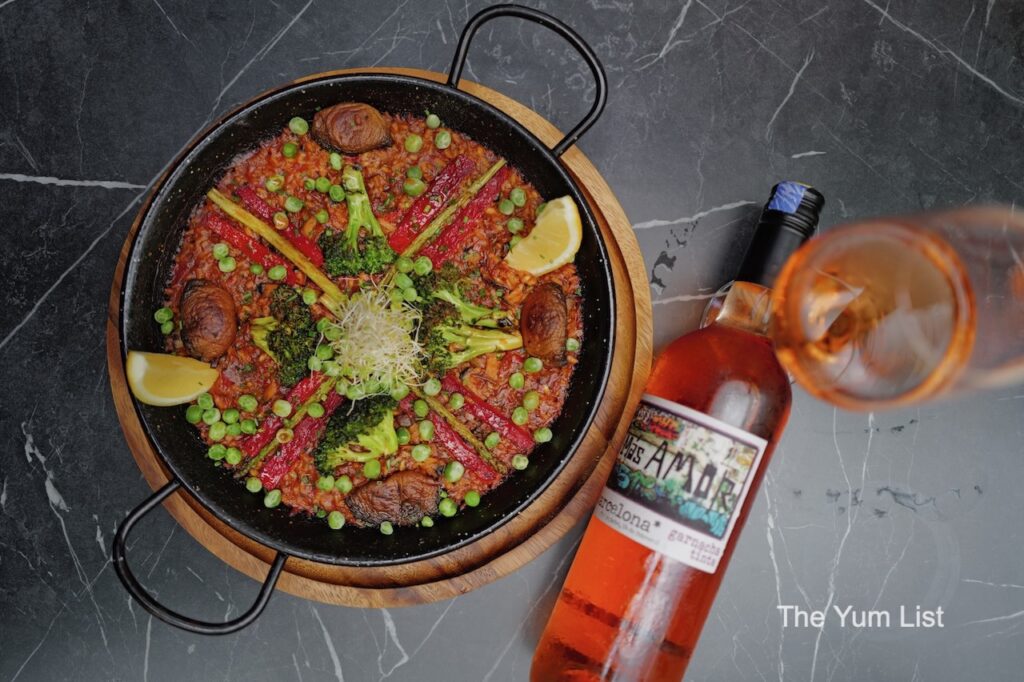 Spanish Tapas Restaurant KL Paella de Verduras and rose wine bottle