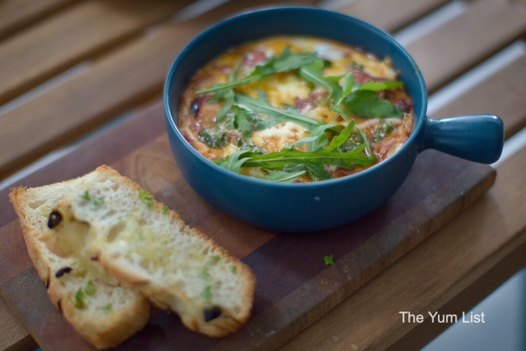 Pizza Roma The Original Malaysia D'Rapport Residences Baked Eggs in blue dish with bread slices