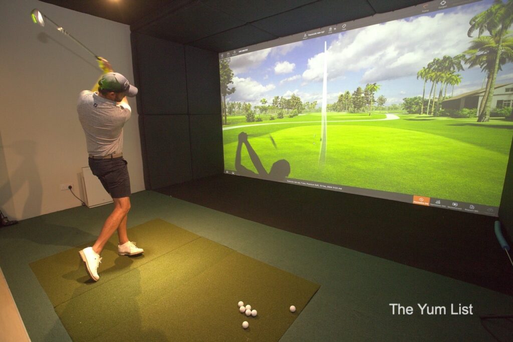 Fun things to do in KL PGA coach Francois Van Zyl hitting the golf ball into the simulator