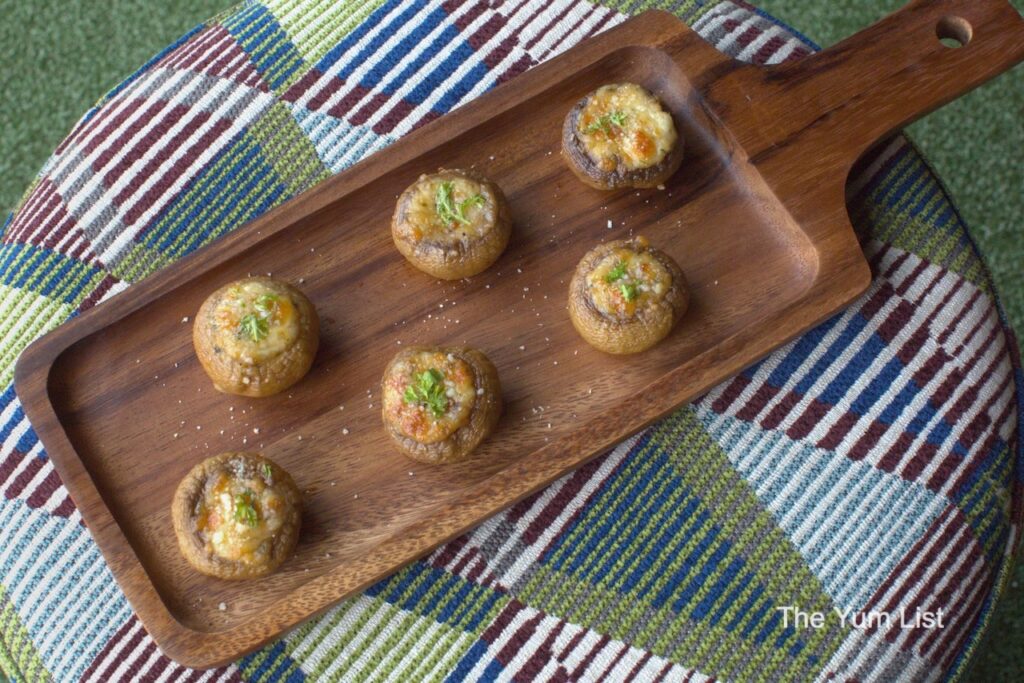 Wedge Range Golf Bar & Social Club, Petaling Jaya Stuffed Mushrooms bites on wooden board