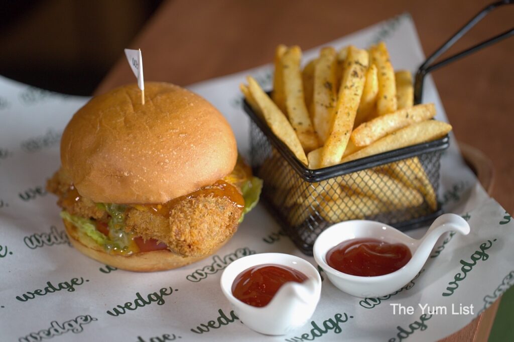 Wedge Range Golf Bar & Social Club, Petaling Jaya Crispy Chicken Sand-Wedge Burger with basket of chips