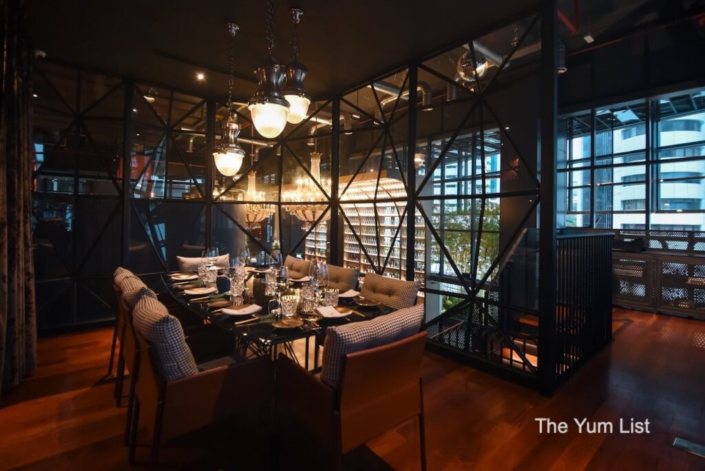 Beautiful steakhouse restaurant KL semi-private dining area with glass walls