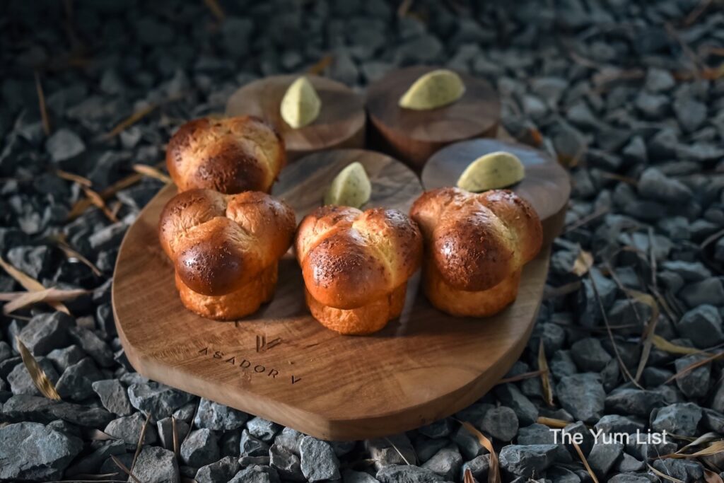 Asador V Kuala Lumpur Parmesan Rosemary Brioche Buns on wooden board