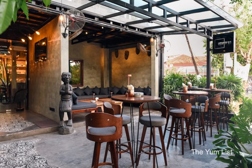 Infusion Bar Siem Reap - outdoor patio surrounded by greenery