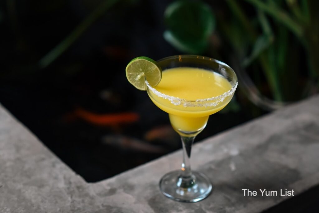 Sustainable Craft Cocktails Cambodia - Passionita beautiful cocktail in Margarita glass