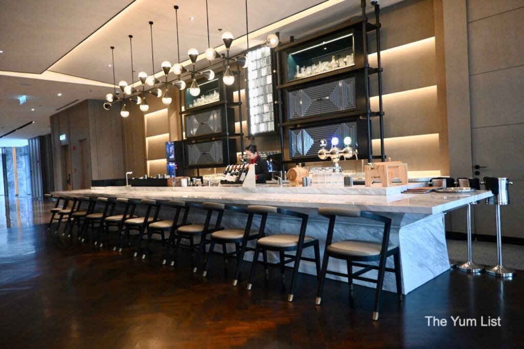 The Great Room, Penang Marriott Hotel - long marble bar with pendant lights