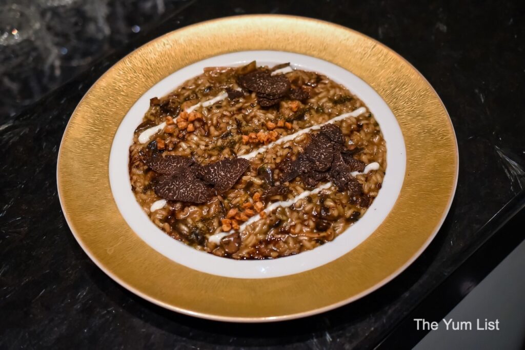 Risotto al Ragu di Anatra con Tartufo Nero, Salsa al Parmigiano e Glassa al Balsamico 