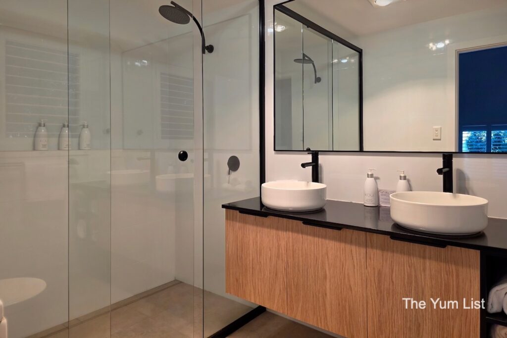Bathroom with Twin Basins & Twin Rain Shower Heads Chimes Spa Retreat
