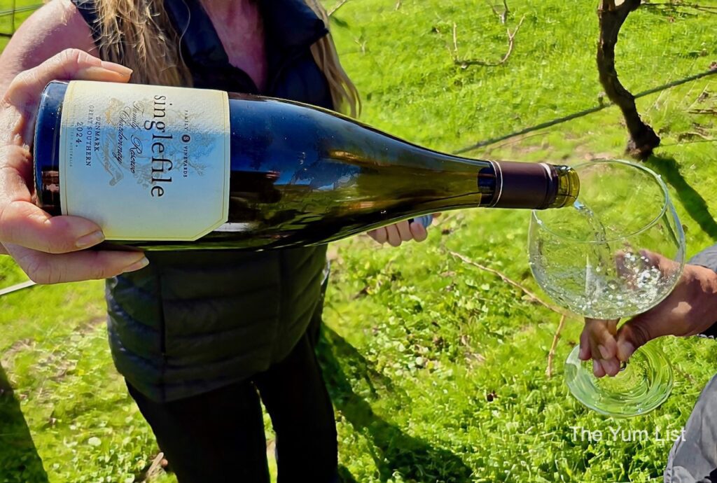 A Glass of Chardonnay Amongst the Vines that Grew It